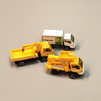 Micro Miniature Car Lot of 3 – Road Construction & Delivery Trucks (Pre-Owned)