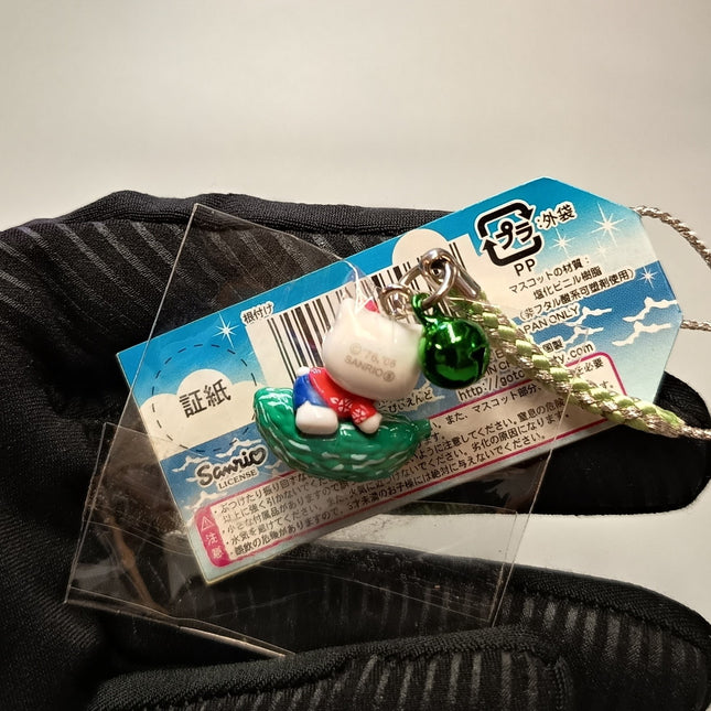 Sanrio Hello Kitty Riding Bitter Melon – 3/4" Keychain (2006) (Pre-Owned)