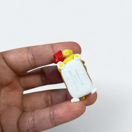 Pokemon Yamper Eating 1.5" Mini Figure – Munching Mascot (Takara Tomy, Pre-Owned)