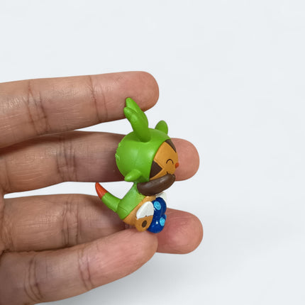 Pokemon Chespin Eating 1.5" Mini Figure – Munching Mascot (Takara Tomy, Pre-Owned)