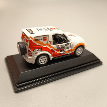 1/72 Real X Mitsubishi Pajero Rally Racer – Diecast Model w Stand & Case (Pre-Owned)