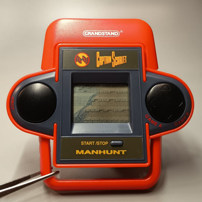 Grandstand 1992 CAPTAIN SCARLET MANHUNT Red Handheld Retro Game Toy TESTED WORK