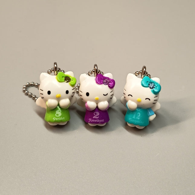 Sanrio Angel Hello Kitty Birth Stone Mascots – Lot of 3 Keychains (Pre-Owned)