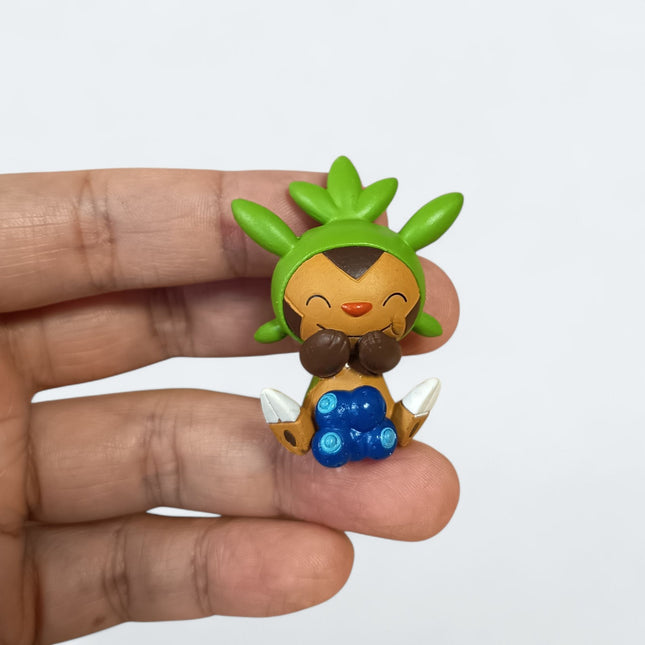 Pokemon Chespin Eating 1.5" Mini Figure – Munching Mascot (Takara Tomy, Pre-Owned)