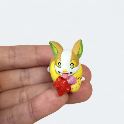 Pokemon Yamper Eating 1.5" Mini Figure – Munching Mascot (Takara Tomy, Pre-Owned)