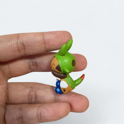 Pokemon Chespin Eating 1.5" Mini Figure – Munching Mascot (Takara Tomy, Pre-Owned)
