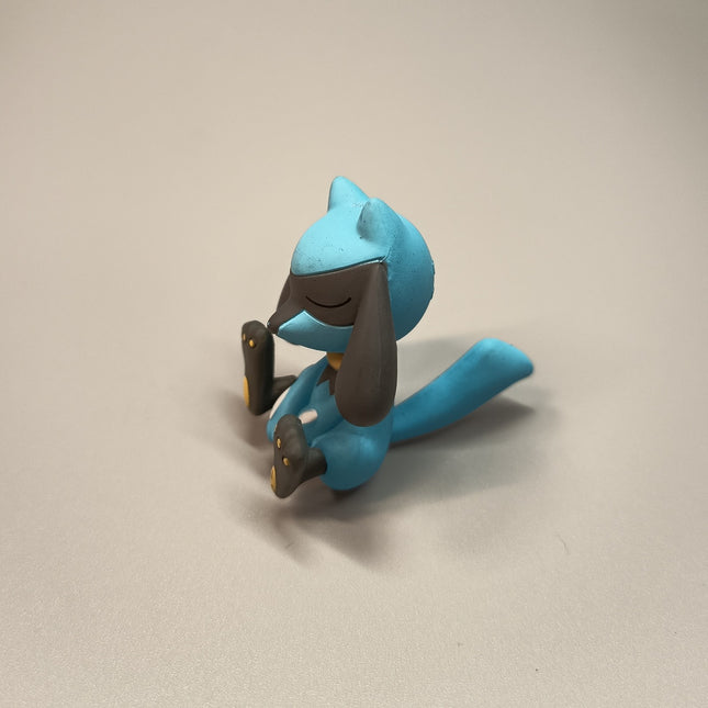 Pokemon Riolu Sleeping 2" Mini Figure – Mascot Toy (Takara Tomy, Pre-Owned)