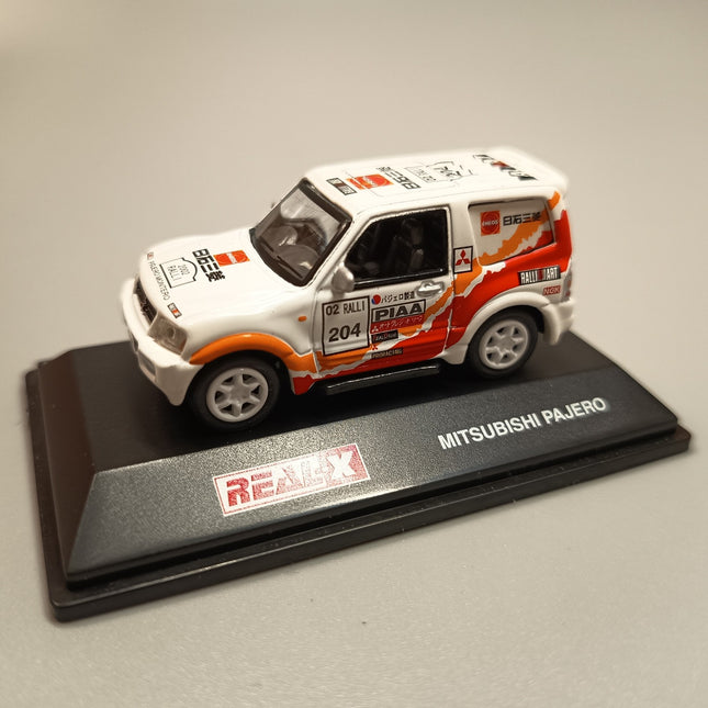1/72 Real X Mitsubishi Pajero Rally Racer – Diecast Model w Stand & Case (Pre-Owned)