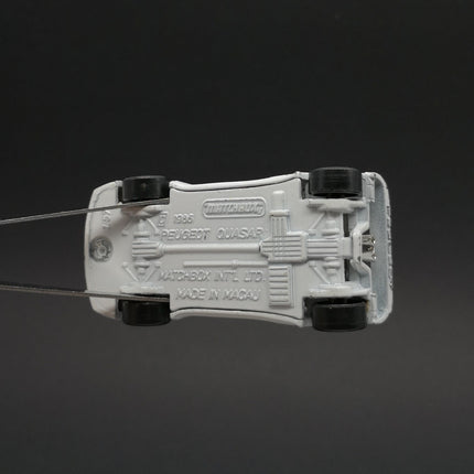 Matchbox Peugeot Quasar 1986 White – 1/57 Diecast Race Car (Pre-Owned)
