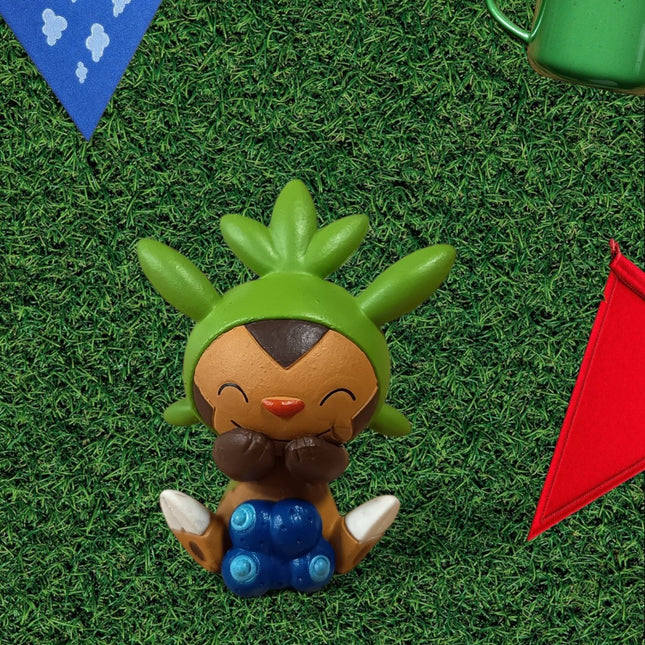 Pokemon Chespin Eating 1.5" Mini Figure – Munching Mascot (Takara Tomy, Pre-Owned)