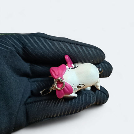 Peanuts Snoopy Sister Belle – 1.75" Keychain Charm (Schleich Germany, Pre-Owned)