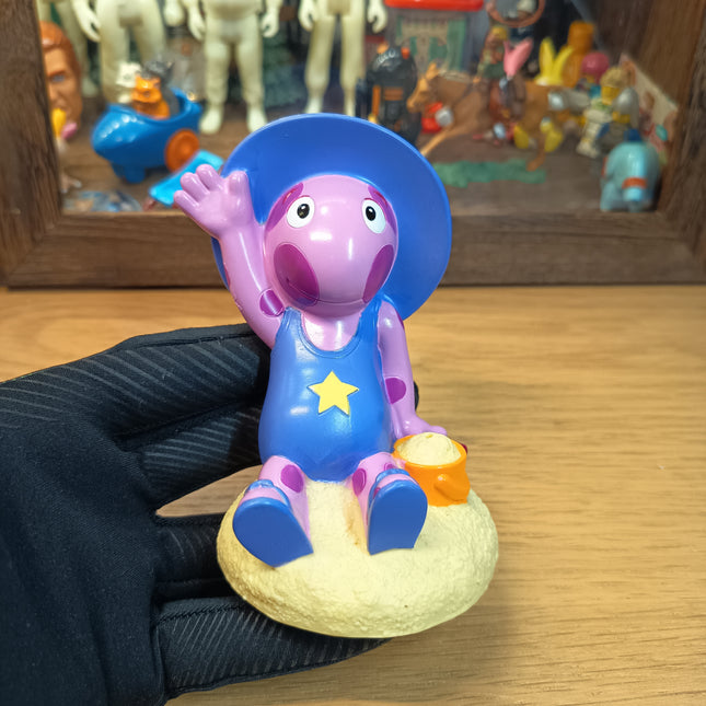 Pre-owned Fisher-Price Backyardigans Splashtime Uniqua 4.5 inch water toy figure for bath play or display.