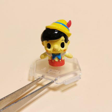 Disney Pinocchio x Devil Robot 1" Mini Figure with Stand – Yujin Gacha (Pre-Owned)