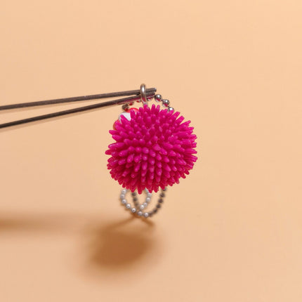 Sanrio Hello Kitty Sleeping in Pink Urchin – 1/2" Keychain (Pre-Owned)