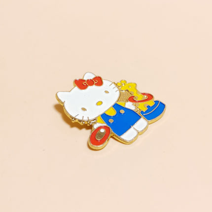 Hello Kitty with Giraffe Ring Toss – 1.4" Enamel Pin (90s, Rare, Pre-Owned)