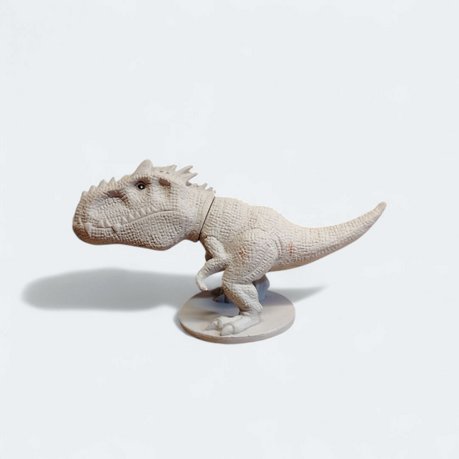 Jurassic World Indominus Rex – 2" Dinosaur Figure (TCC Global, Pre-Owned)