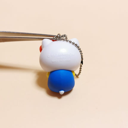 Sanrio Hello Kitty Sitting – 1.25" Manmaru Keychain (2023, Pre-Owned)