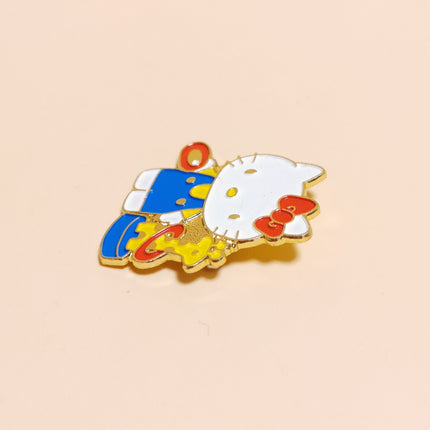 Hello Kitty with Giraffe Ring Toss – 1.4" Enamel Pin (90s, Rare, Pre-Owned)