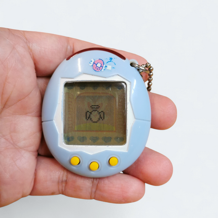 Tamagotchi Connection V1 Light Blue – Tested Working (Bandai, Pre-Owned)