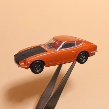 Miniature Nissan Fairlady Z 432 Orange – 2.5" Plastic Toy Car (TOMY, Pre-Owned)