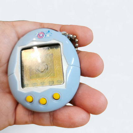 Tamagotchi Connection V1 Light Blue – Tested Working (Bandai, Pre-Owned)