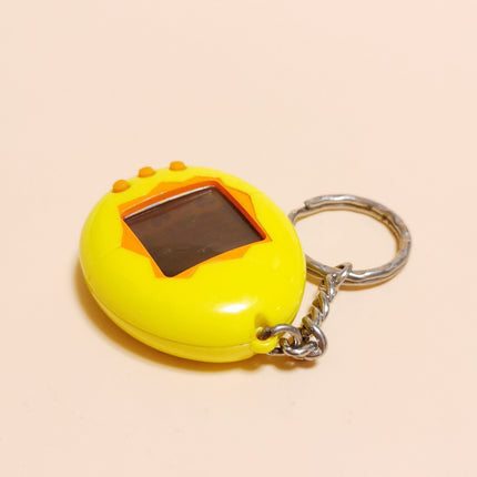 Bandai 1997 Tamagotchi Original Yellow Shell Wizkids English (Tested, Pre-Owned)