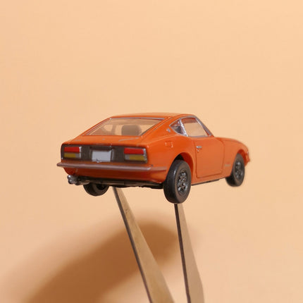 Miniature Nissan Fairlady Z 432 Orange – 2.5" Plastic Toy Car (TOMY, Pre-Owned)
