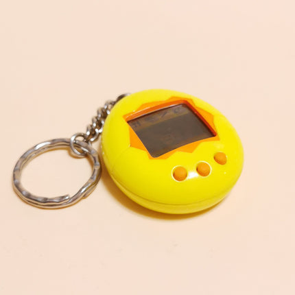 Bandai 1997 Tamagotchi Original Yellow Shell Wizkids English (Tested, Pre-Owned)