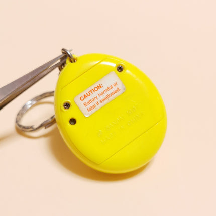 Bandai 1997 Tamagotchi Original Yellow Shell Wizkids English (Tested, Pre-Owned)