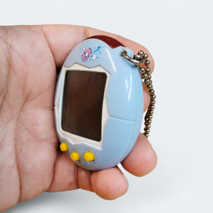 Tamagotchi Connection V1 Light Blue – Tested Working (Bandai, Pre-Owned)