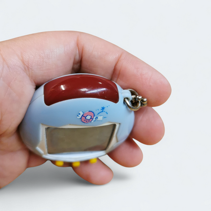 Tamagotchi Connection V1 Light Blue – Tested Working (Bandai, Pre-Owned)