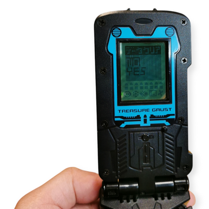 Bandai 2006 Treasure Gaust Strap Gunman Silver – Handheld Game (Rare, Pre-Owned)