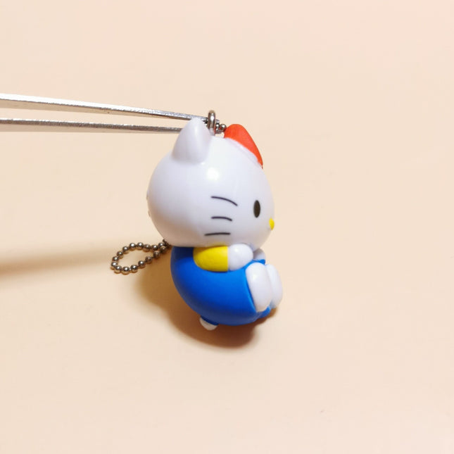 Sanrio Hello Kitty Sitting – 1.25" Manmaru Keychain (2023, Pre-Owned)