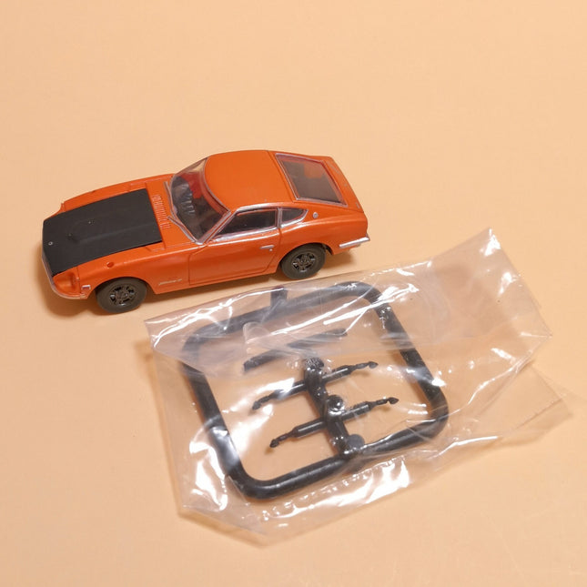 Miniature Nissan Fairlady Z 432 Orange – 2.5" Plastic Toy Car (TOMY, Pre-Owned)