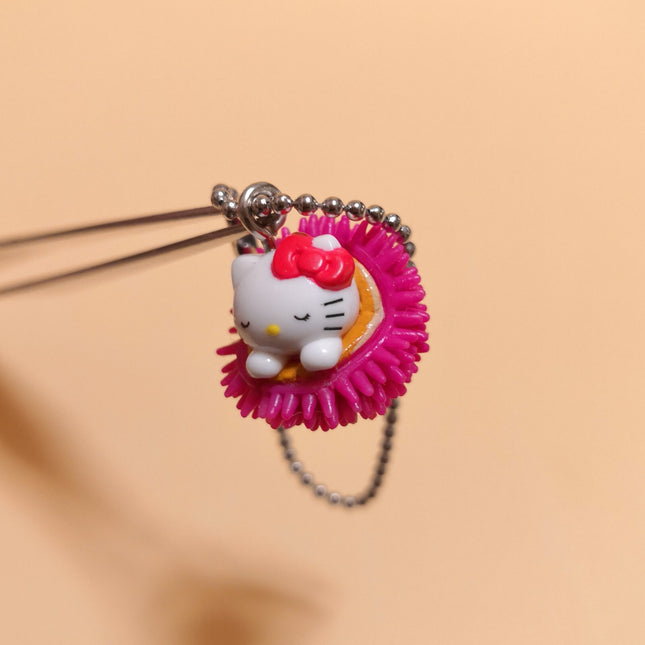 Sanrio Hello Kitty Sleeping in Pink Urchin – 1/2" Keychain (Pre-Owned)