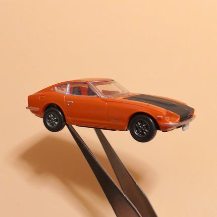 Miniature Nissan Fairlady Z 432 Orange – 2.5" Plastic Toy Car (TOMY, Pre-Owned)